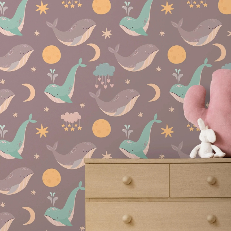 Colorful Whales whale pattern wallpaper with pink and mint whales and moons on mauve