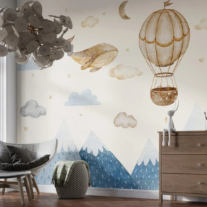 Celestial Voyage flying whale wallpaper mural with a whale and balloon over denim blue mountains