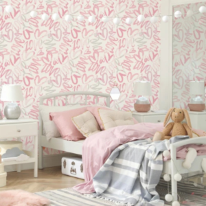 Letter Beam #1 pink lettering wallpaper with overlapping brush letters in a girl’s bedroom