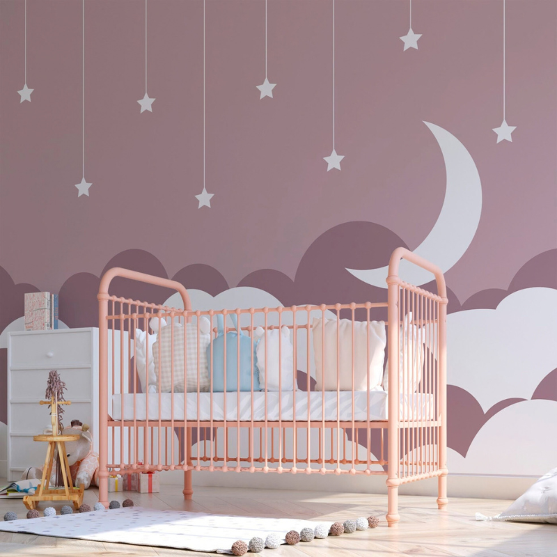 Plum Moon nursery wallpaper mural with a white crescent moon and hanging stars over plum clouds