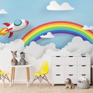 Cosmic Sky wallpaper mural with a paper-cut rocket crossing a rainbow above clouds