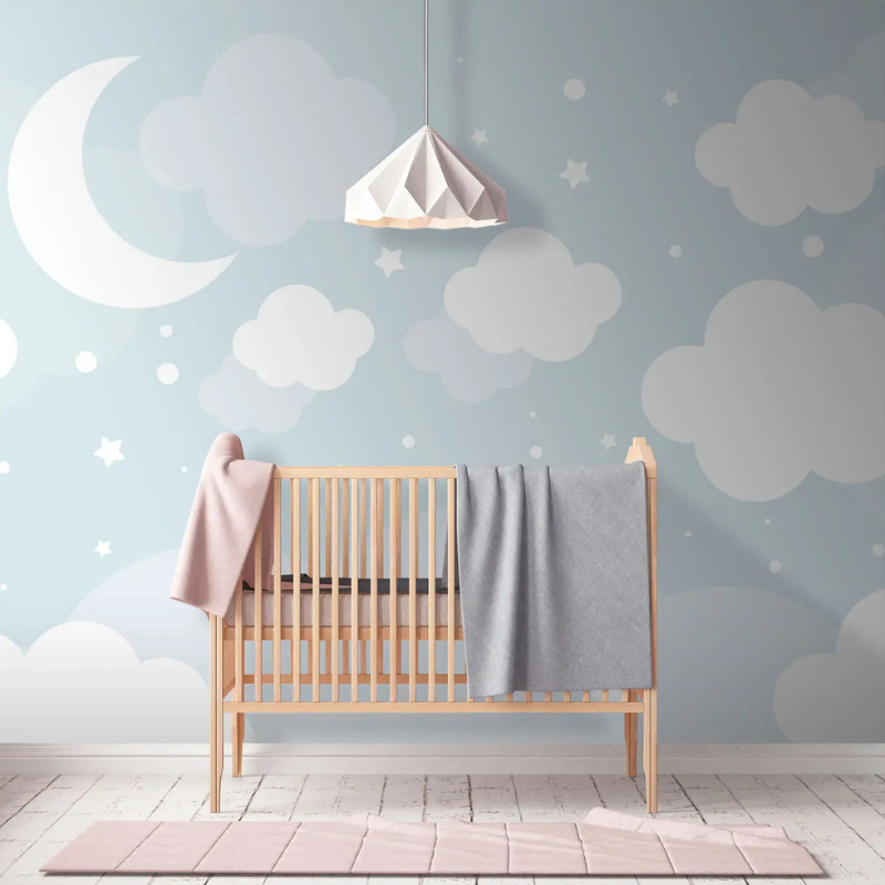 Serenity moon and clouds wallpaper mural with a white crescent moon and stars in a nursery